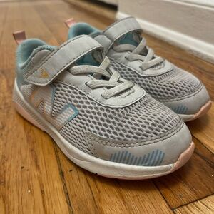New Balance Kids Sneakers in Gray with Blue and Pink Highlights